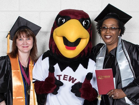 Honors Graduates with Rudy the Red Hawk