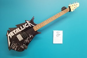 Metallica guitar and wall plaque