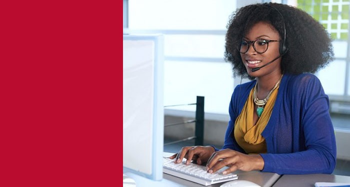 Administrative Professional student at a work station