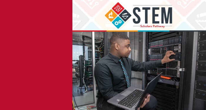 STEM Scholars logo and image of a student at a server