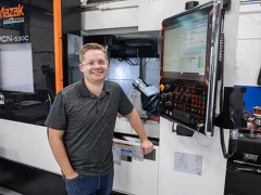 Kent Schopp in front of CNC equipment